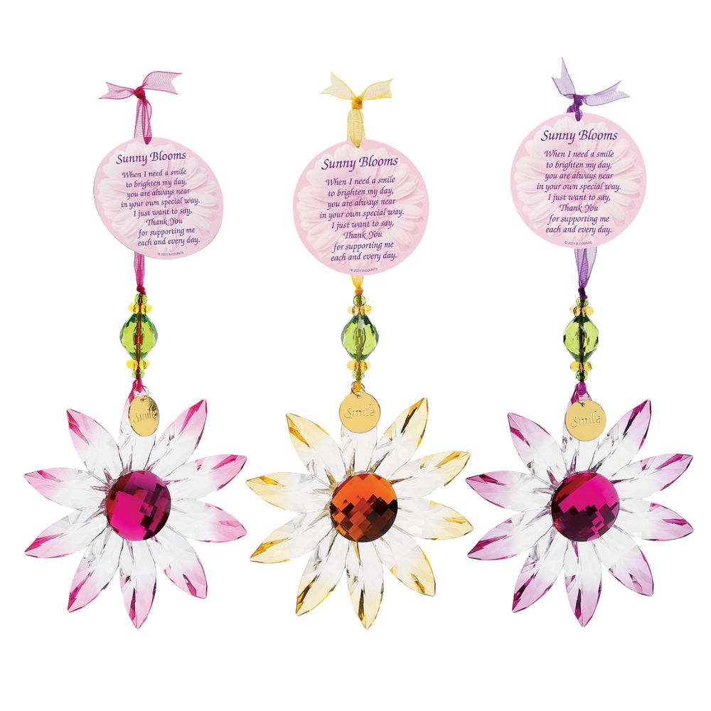 Suncatcher Acrylic Daisy Hanging Ornament Purple  Hung on a colour matching organza ribbon, this colourful Daisy is the perfect gift for a loved one. Comes with a poem tag and token attached. Can be displayed with others from the acrylic collection.