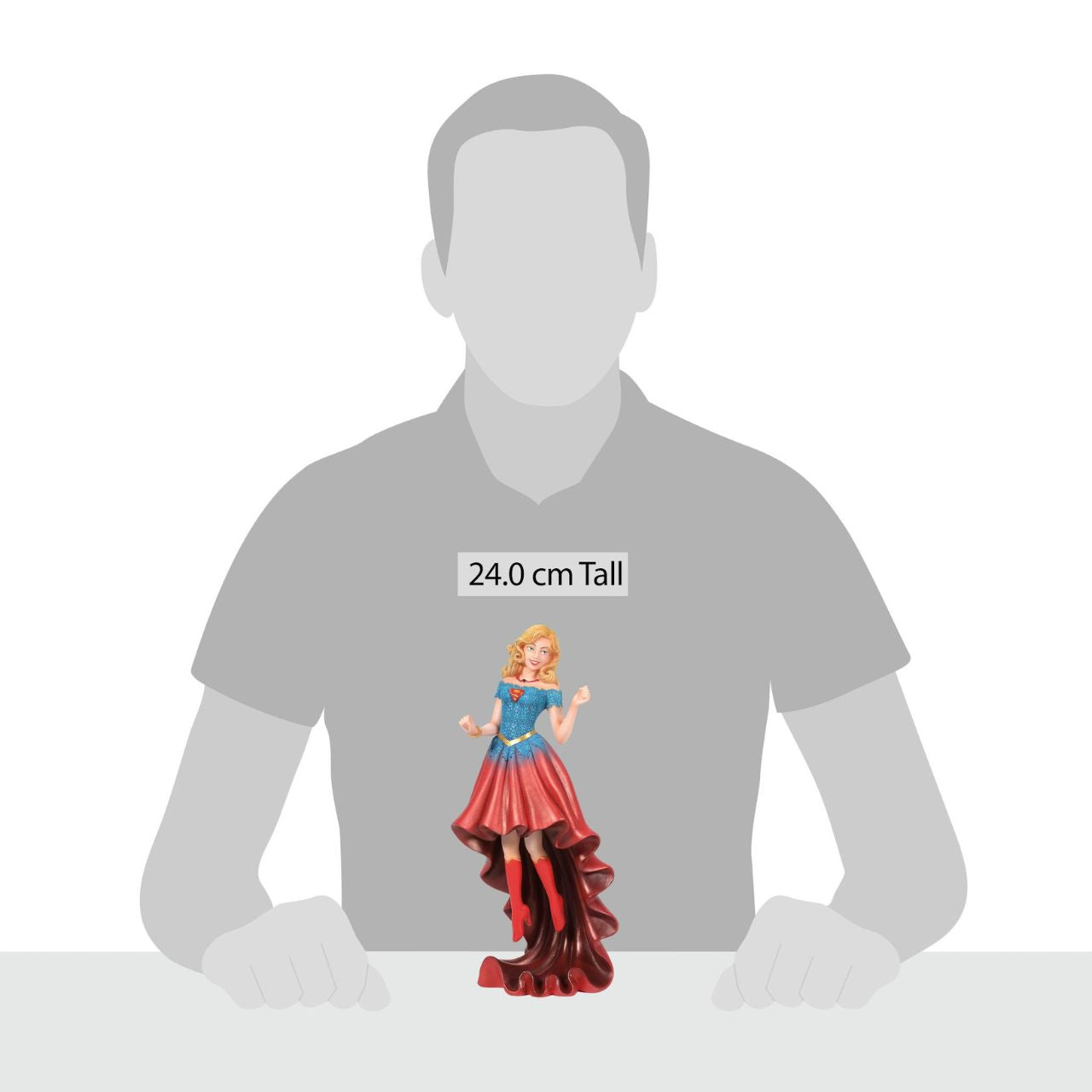 Fierce meets fabulous in this meticulously reimagined hand-crafted figure inspired by DC Comics most iconic heroines and villains. Shimmering with metallic paint accents on her flowing stylish skirt, Supergirl is mid-flight ready to conquer the world.