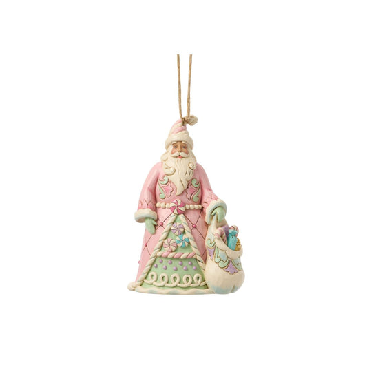 This cheerful Santa ornament carries a sack overflowing with colourful candy delights. Jim Shore's hand-painted details and rosemaling patterns give Santa a rich, festive charm. A sugary-sweet nod to childhood holiday dreams.