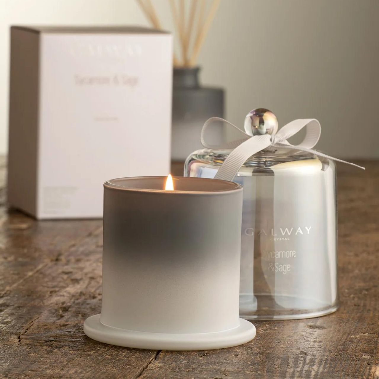 Sycamore & Sage Scented Bell Jar Candle  Transport yourself to a special place with the perfect fragrance for your home. Our Sycamore & Sage scent will transform any room and certainly set the right mood.