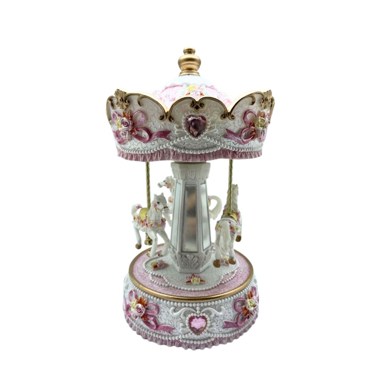 White and rose coloured Carousel turns to a welknow melody.
