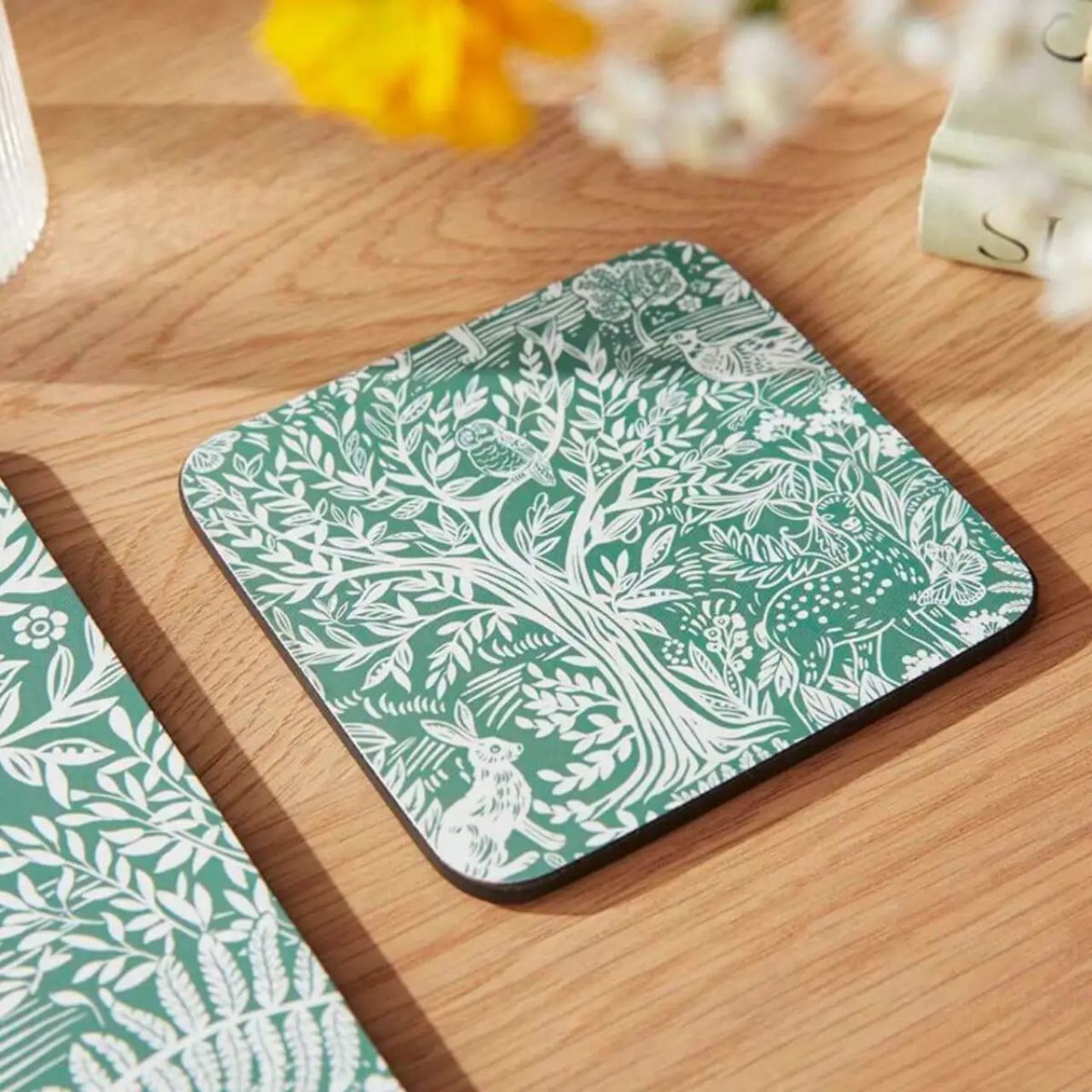 Stunning yet subtle, these hardwearing sage green coasters are full of woodland charm
