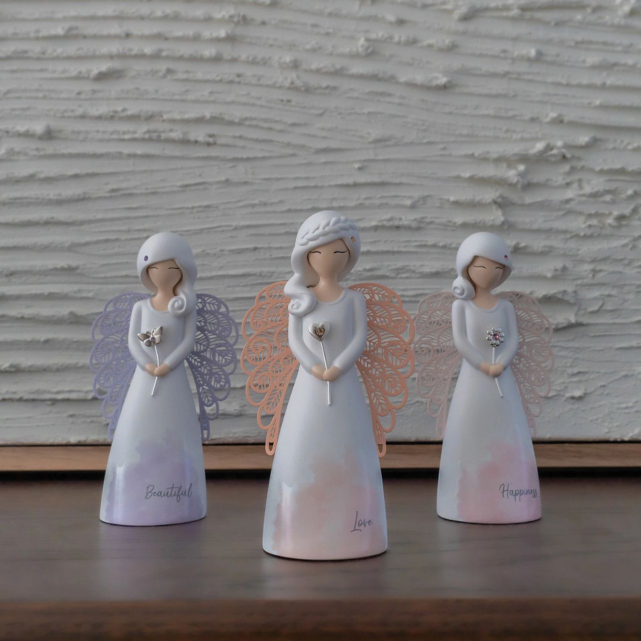 Thank You Angel Figurine - Happiness  Looking for a thoughtful gift that's both beautiful and meaningful? These stunning angels are the perfect way to show someone special just how much they mean to you. Standing 12.5cm tall, they are perfect as a gift and home decoration.