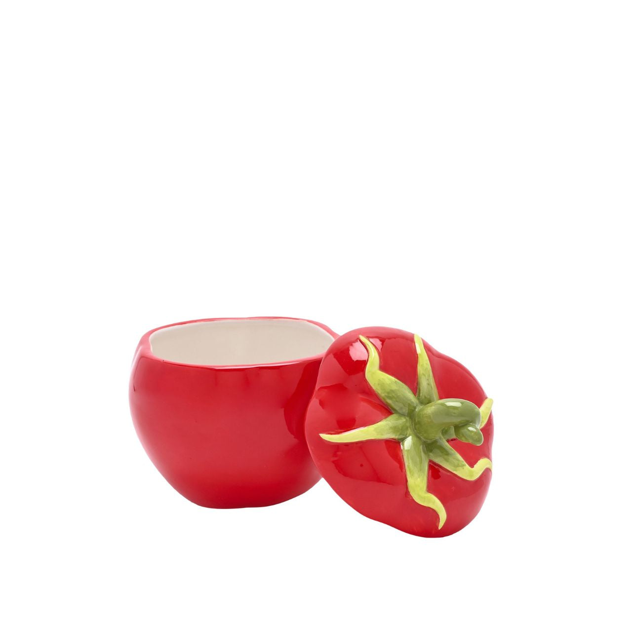 This tomato-shaped ceramic jar, vibrant red with a whimsical green stem, instantly adds a pop of colour and fun to any room. Ideal for storing small items, making it both functional and decorative.