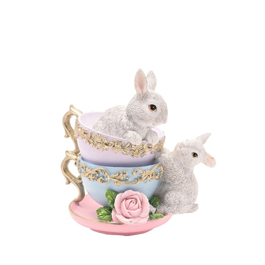 The Easter Stacked Tea Cups &amp; Rabbits Figurine from The Eggs-traordinary Gifting Co is a playful piece for spring and Easter displays.