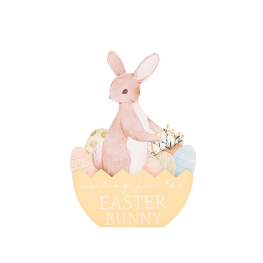 The Eggs-traordinary Gifting Co ‘Waiting For The Easter Bunny’ Plaque is a characterful decorative accent designed for seasonal displays.