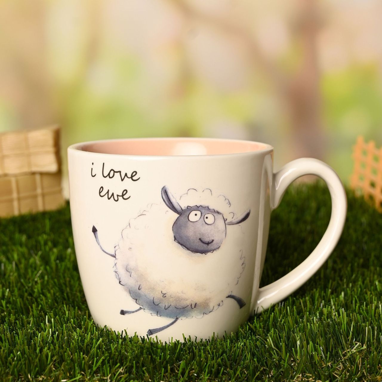 The Funny Farm Mug - "Love Ewe!" adds farmyard charm to daily life with its playful sheep illustration and affectionate caption, embodying the spirit of this character-led collection.