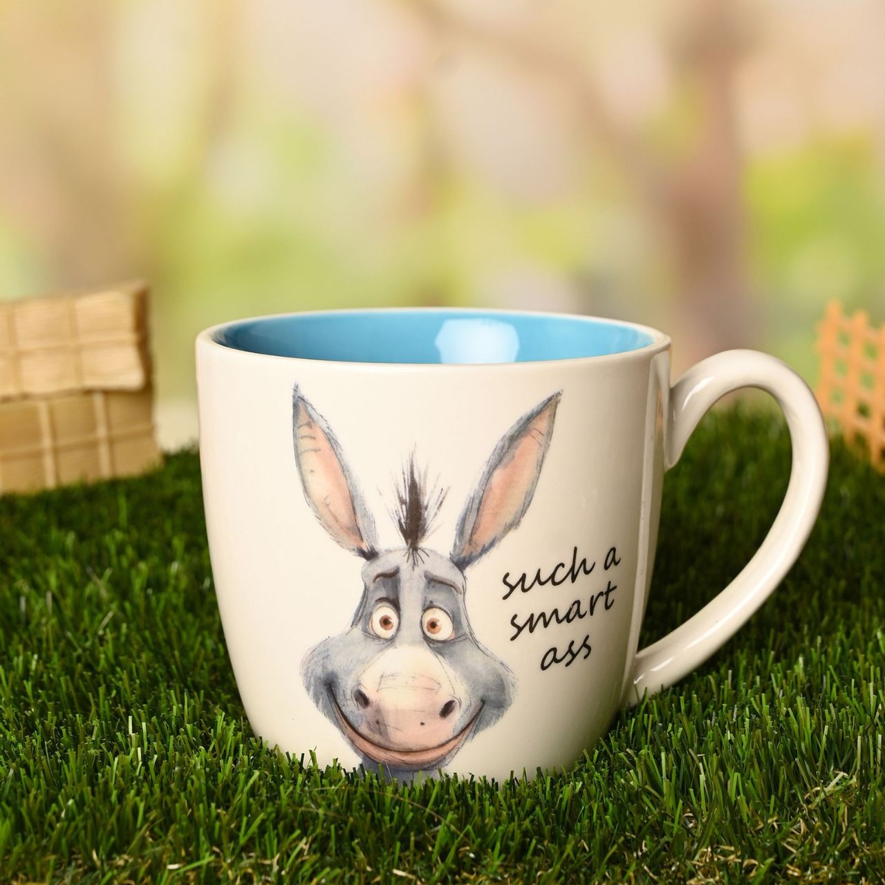 The Funny Farm Mug - "Smart Ass" brings farmyard wit to the morning brew with a cheeky donkey character that captures the playful spirit of this much-loved collection.