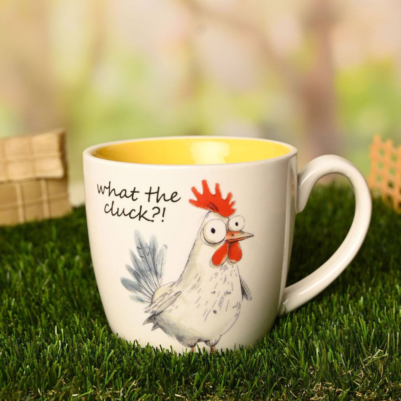 The Funny Farm Mug - "What the Cluck" brings farmyard fun to the morning cuppa, featuring an expressive rooster character that captures the playful spirit of this much-loved collection.