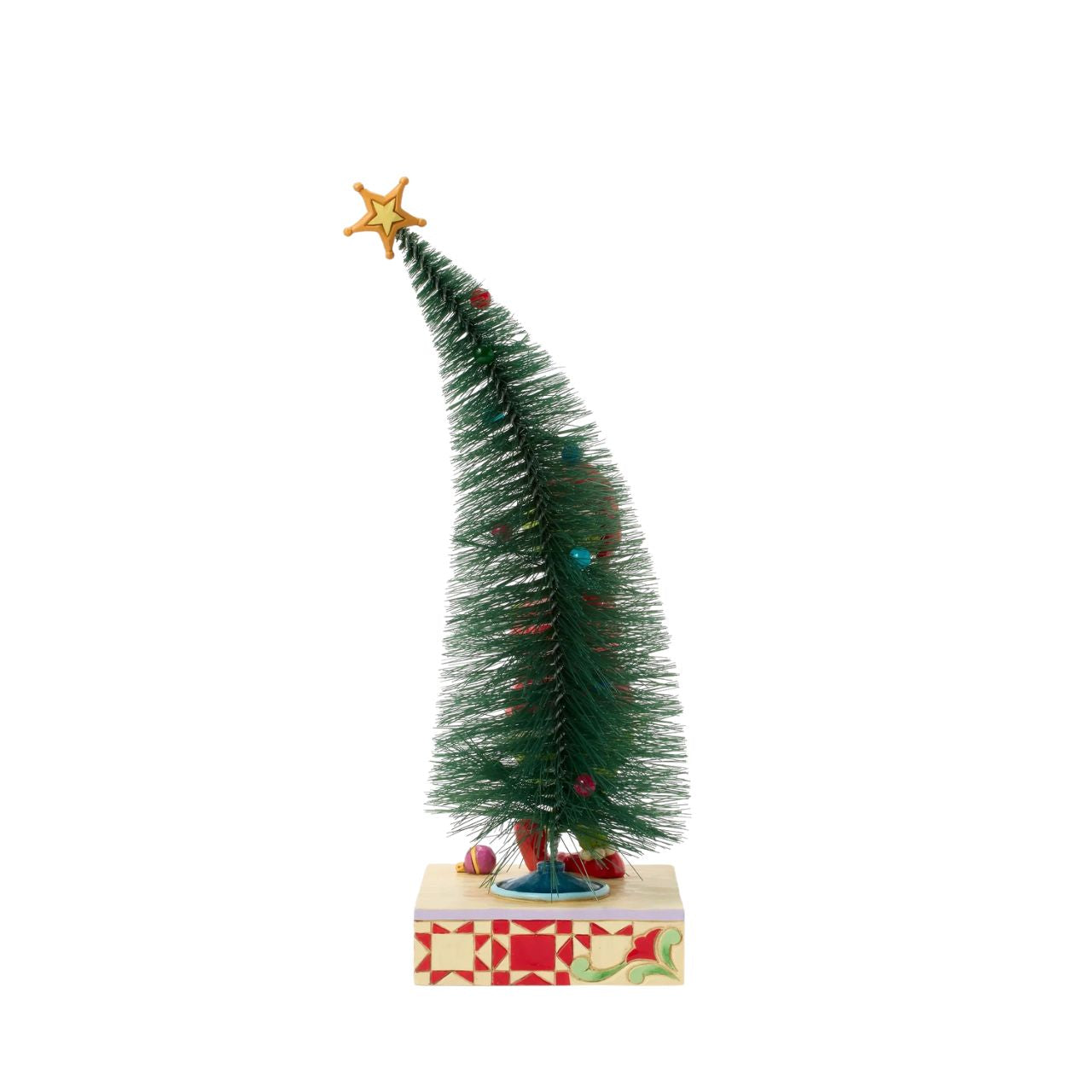This playful Jim Shore design features The Grinch, arms crossed with a smirk, exuding snarky attitude as he stands beside a beautiful sisal tree with vibrant ball ornaments. Bring mischief home with Jim Shore's intricate detailing and rich colours.
