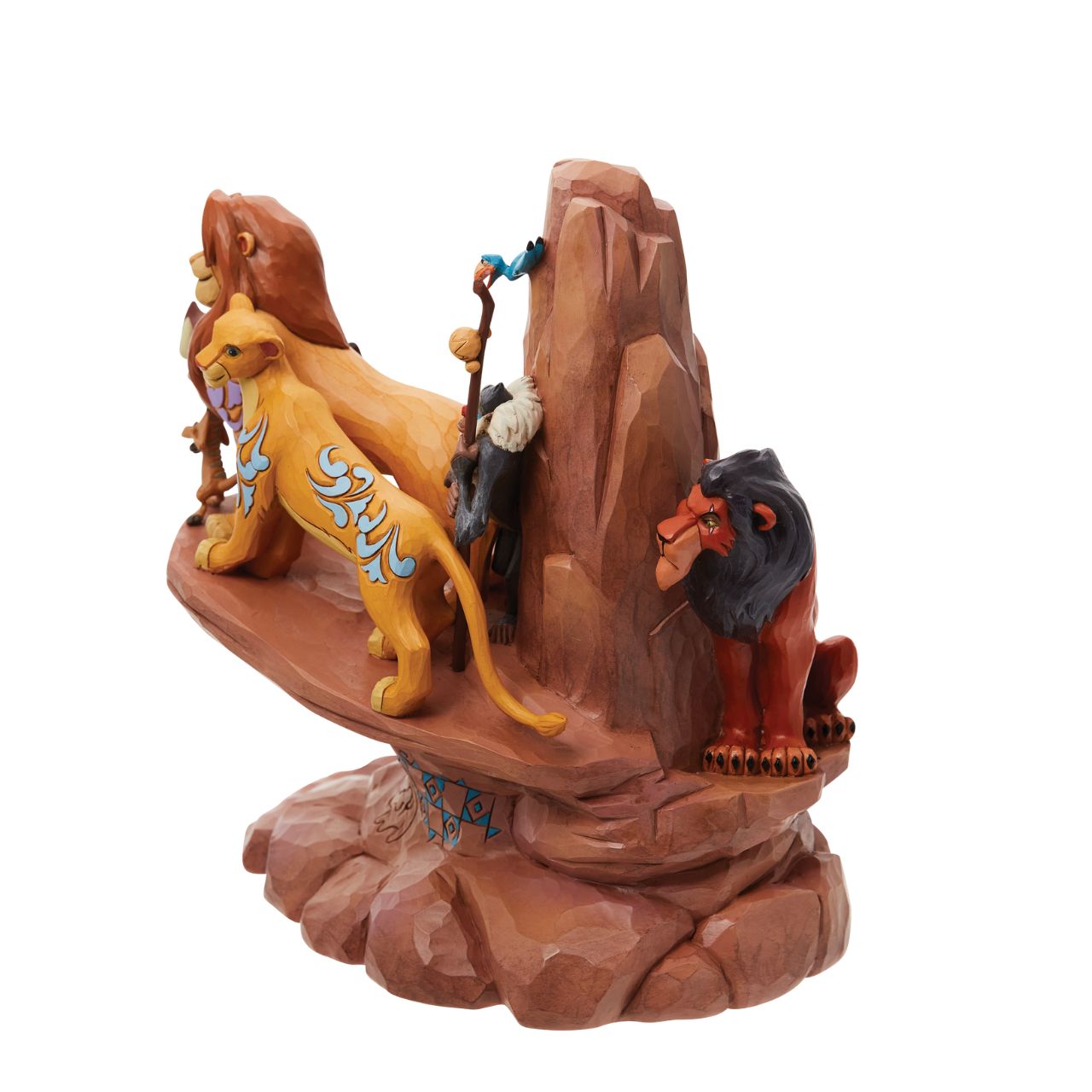 This incredible creation by Jim Shore celebrates the 30th anniversary of Disney's beloved 1994 film, The Lion King. With patchwork patterning and Rafiki's Simba drawing, Pride Rock looks stately as the main characters stand upon the stage.