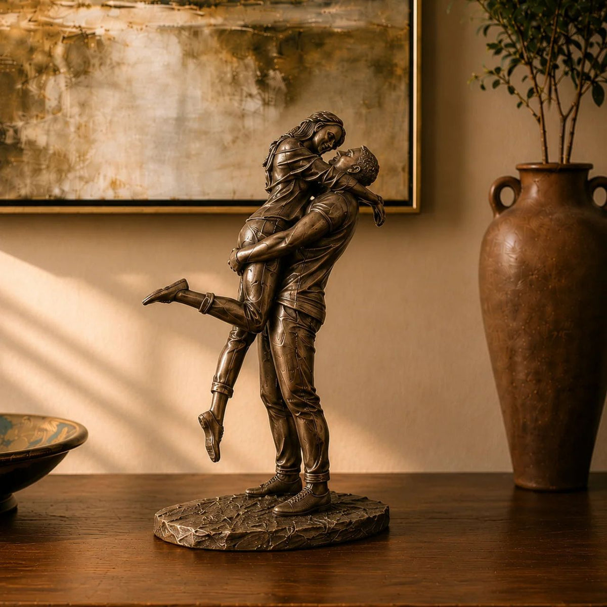 The Promise by Genesis Ireland is an elegant bronze-hued sculpture capturing a couple in a heartfelt embrace. It makes an exquisite gift for discerning art collectors or a meaningful present for occasions like engagements or anniversaries.