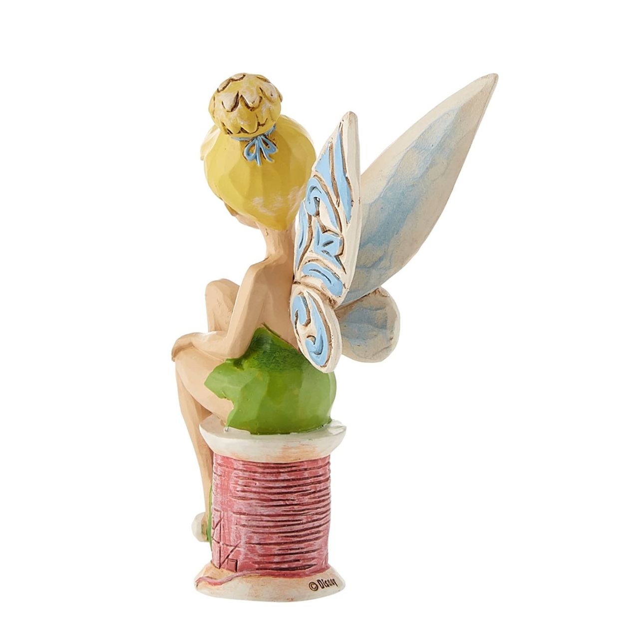 Disney Tinker Bell Crafty Tink Figurine  Tinker Bell takes a rest on a tiny spool of thread. Great for Tink lovers, Jim Shore collectors and sewing enthusiasts alike. A fun and flirty new personality pose from award winning artist and sculptor, Jim Shore.