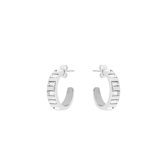 Elevate your elegance with the Tipperary Art Deco Hoop Earrings in silver. These finely crafted hoops showcase timeless Art Deco design, perfect for adding a refined touch to any outfit.