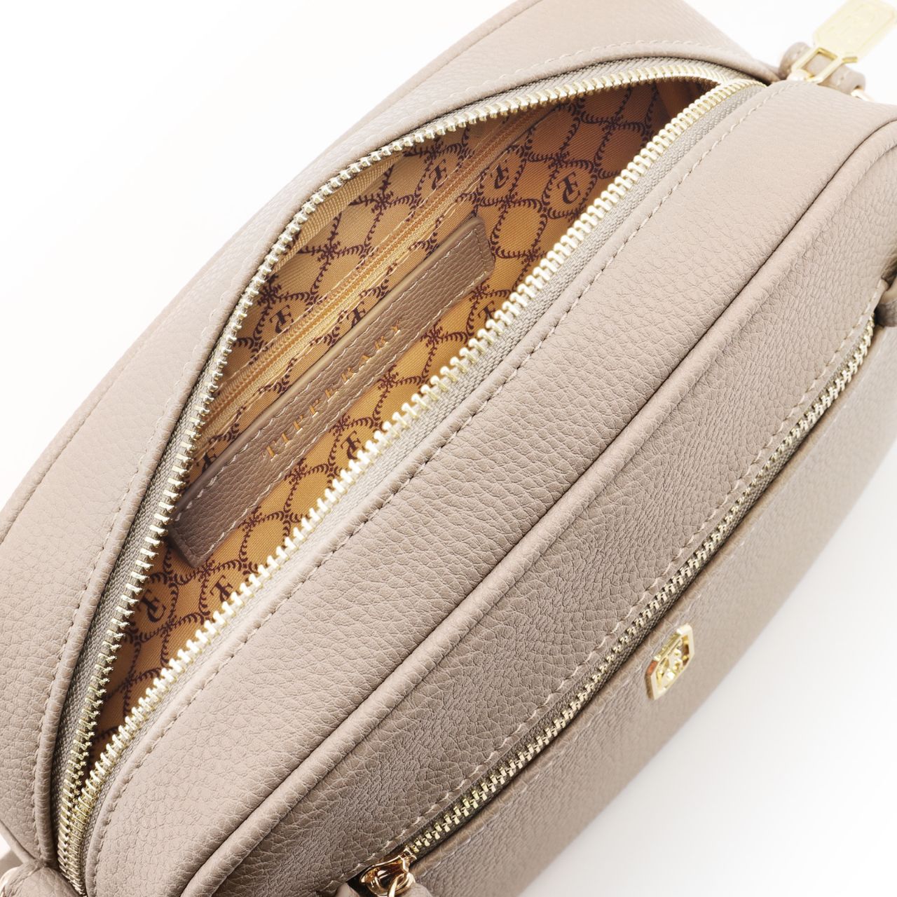 Handbags & Wallets Introducing our exclusive collection of animal friendly PU leather look handbags and wallets. Expertly designed and manufactured. The Tipperary design team travelled the world, visiting all the designer fashion shows in order to create these on-trend chic and functional handbags.