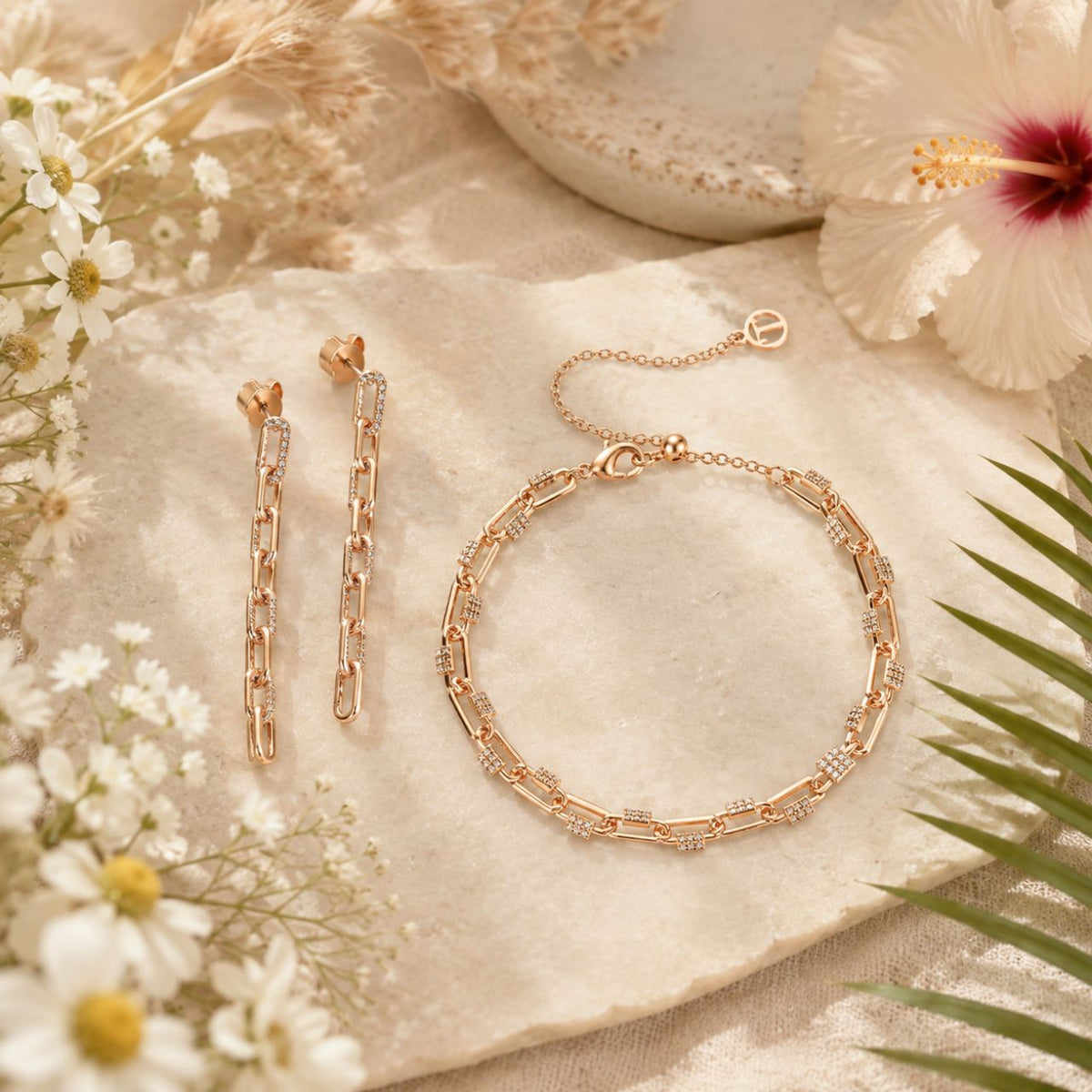 Elegant drop earrings featuring delicate chain detailing and sparkling pave crystals in warm gold tones. These versatile pieces from Tipperary combine timeless design with contemporary flair, perfect for everyday wear or special occasions. 
