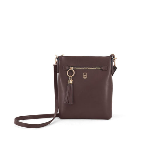 The Chelsea Cross Body Pouch in rich chocolate leather is the perfect everyday companion. This compact Tipperary design features an adjustable cross body strap for hands-free convenience, ideal for keeping essentials close while on the move.