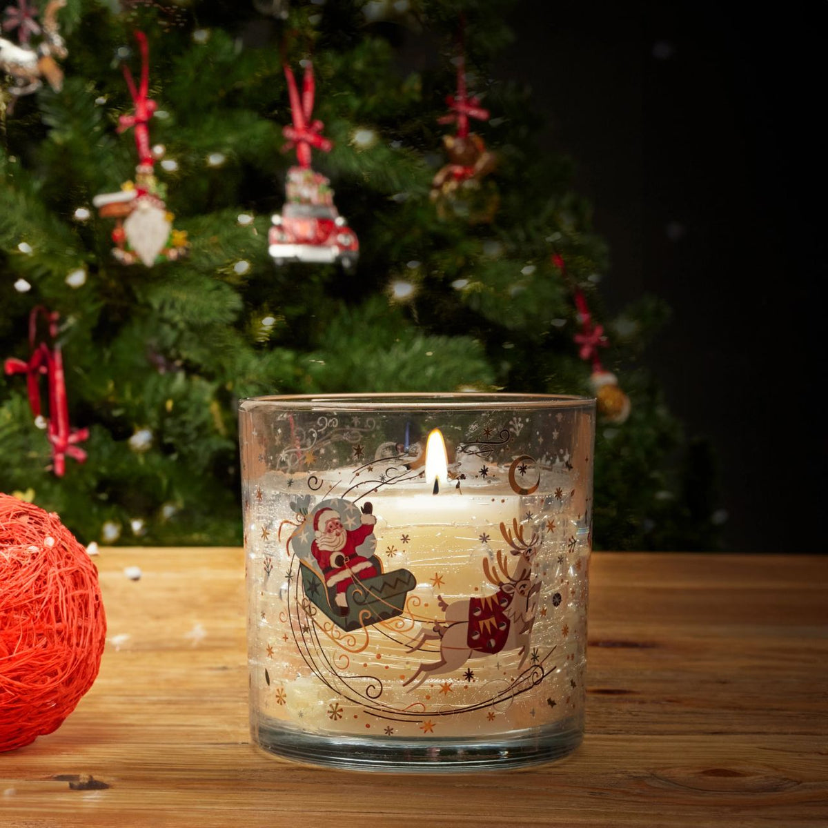 candle is lit, bringing a cheerful ambiance to your home during the festive season.