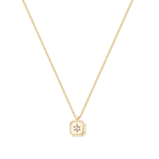 Compass Star Pendant Gold by Tipperary - New 2024  Showcase your sense of style with this beautiful Gold Tipperary Compass Star Pendant. Crafted with exquisite attention to detail, this piece of jewellery is a timeless addition to any wardrobe. Both durable and elegant, ensuring it will remain a treasured item for many years to come.