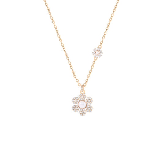 Radiant and romantic, the Daisy CZ Pearl Pendant captures the timeless charm of a flower in bloom. From the Daisy Collection, this necklace brings a feminine touch of sparkle and elegance, perfect for brightening everyday wear or adding a graceful finish to evening looks.