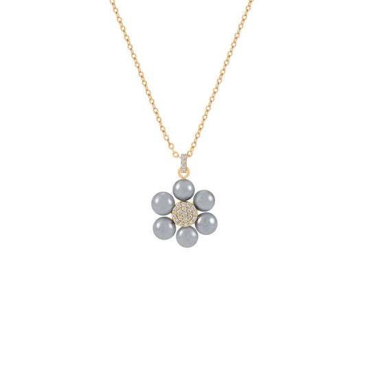 This striking Daisy Grey Pearl Pendant combines the timeless charm of pearls with the radiance of sparkling CZ stones. The flower design features lustrous grey pearl petals encircling a brilliant CZ pavé centre, suspended elegantly from a polished gold chain.