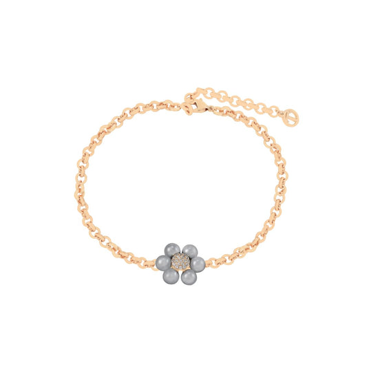 This elegant bracelet features a single daisy motif crafted with lustrous grey pearl petals and a sparkling CZ pavé centre, beautifully set on a polished gold chain. Minimalist yet eye-catching, this bracelet is perfect for layering with other pieces or wearing as a delicate standalone accessory.