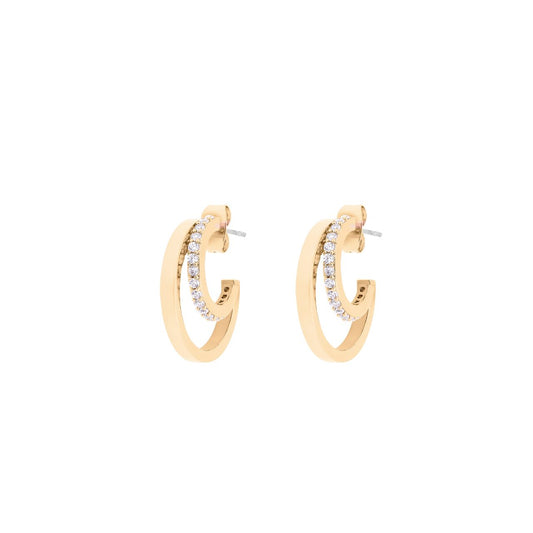 Elevate your elegance with the Tipperary Double C Earrings in Gold. This striking design blends classic charm with modern sophistication, making it a versatile accessory for any occasion.