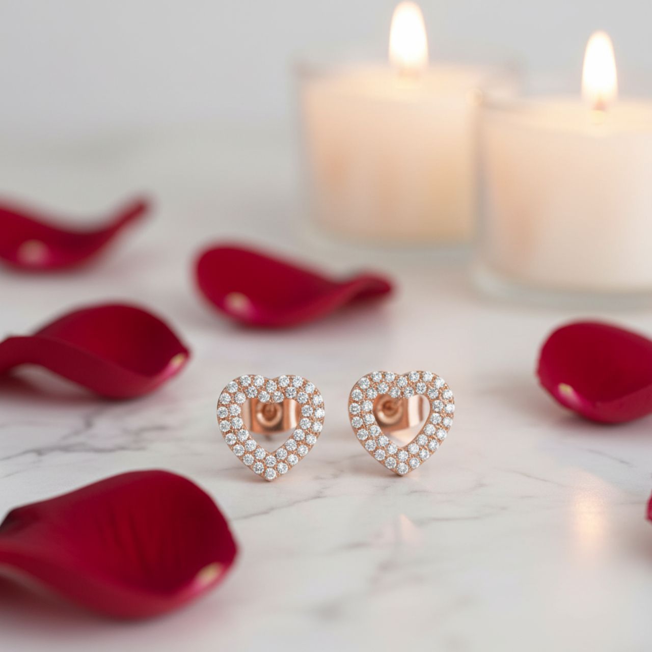 Simple yet elegantly dazzling these clear stone open heart shaped stud earrings are the perfect partner to our double pavé pendant.