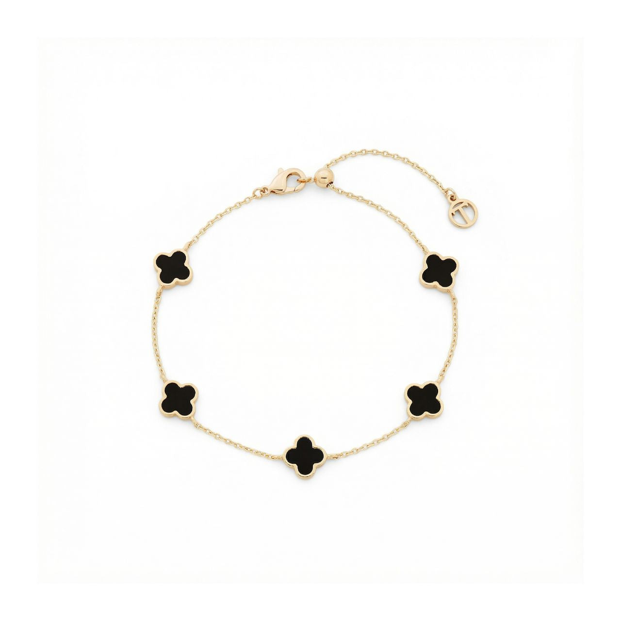 Elevate your everyday elegance with this stunning Black Onyx Fleur Bracelet from Tipperary's celebrated collection. Crafted in lustrous gold, the delicate fleur design captures timeless sophistication while the rich black onyx stone adds depth and intrigue to your wrist.