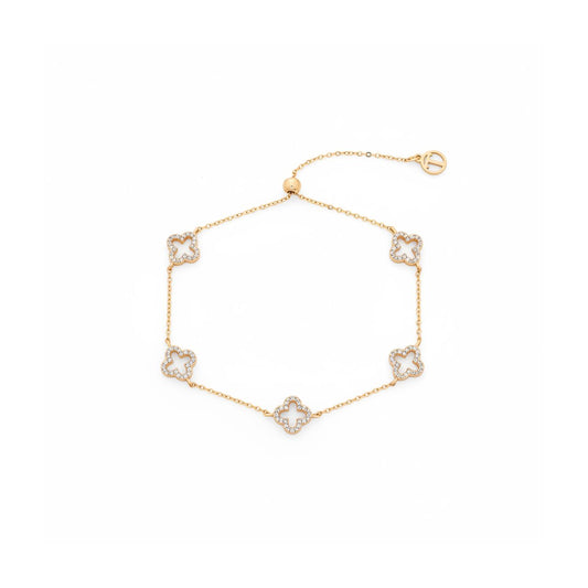 Elevate your everyday elegance with this stunning Fleur bracelet from Tipperary's celebrated collection. Featuring five brilliantly set cubic zirconia insets arranged in an exquisite fleur-de-lis pattern, this gold bracelet captures light beautifully while maintaining timeless sophistication.