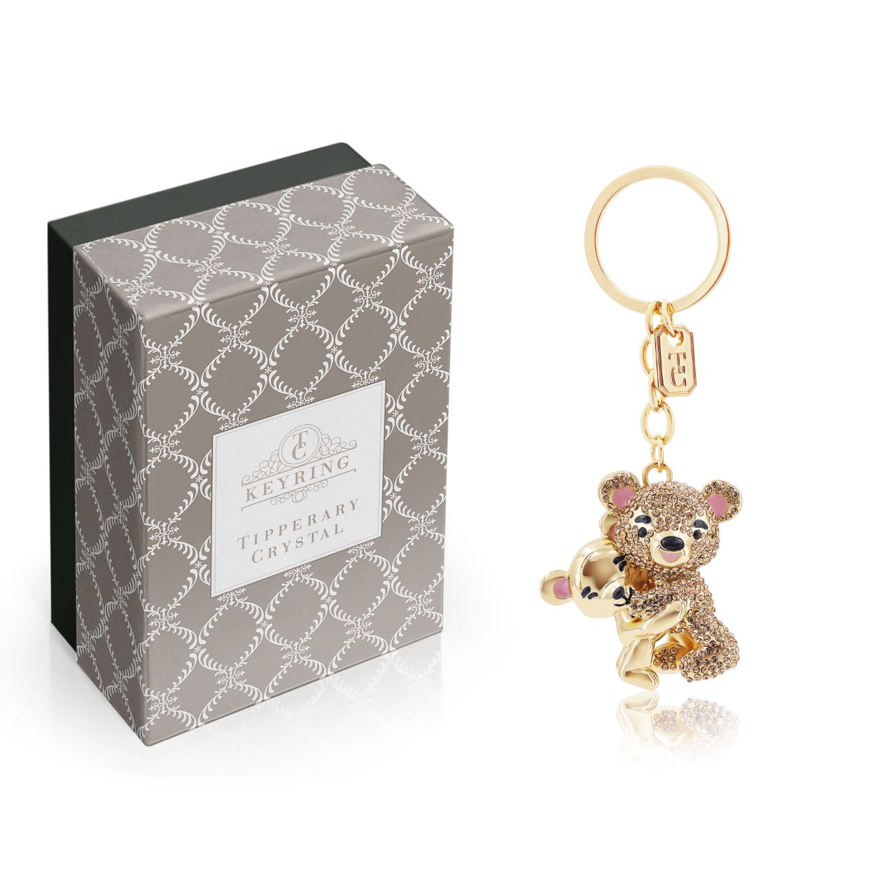 Gold Hugging Bears Keyring by Tipperary Crystal  Transform your keys to a fashion statement with this beautiful Gold Hugging Bears keyring.