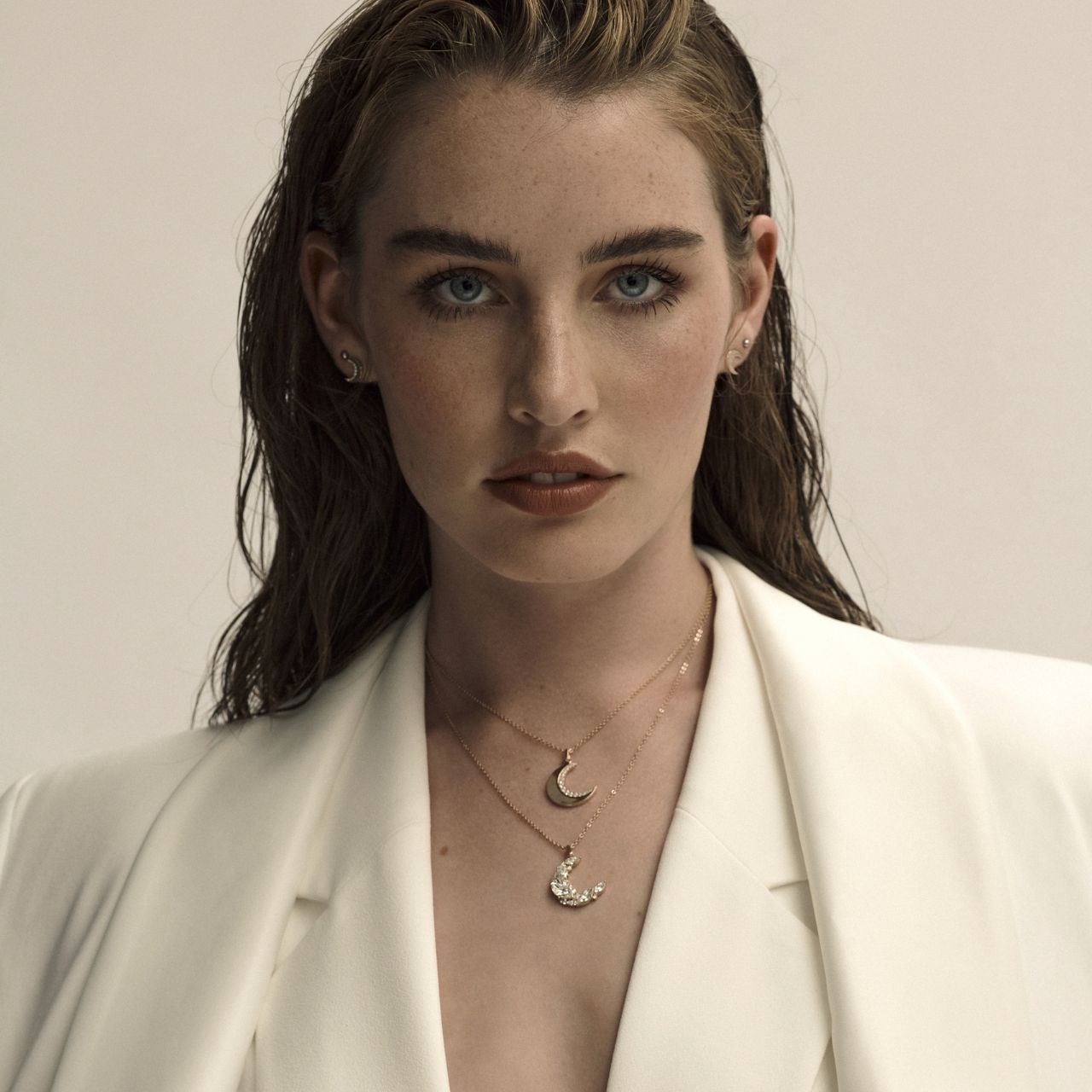 Half Moon Rose Gold Pendant by Tipperary Crystal  Inspired by the hypnotic energy of the glowing moon, this collection is contemporary and minimalist yet luxuriously adorned with the clearest sparkling stones.