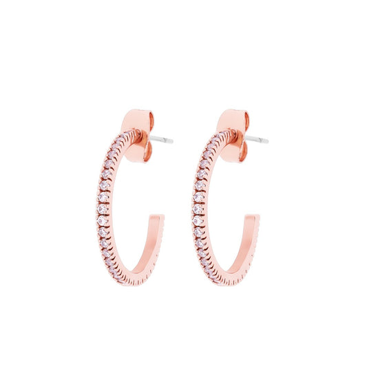 Hoop Earrings Pave Set Rose Gold by Tipperary  Introducing the Tipperary Hoop Earrings Pave Set Rose Gold—a stunning accessory crafted with rose gold material, pave set stones, and finished with a hoop closure to provide a secure fit. These earrings will add a sophisticated twist to any look.