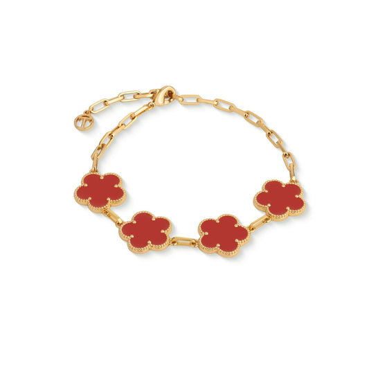 Introducing the Le Fleur Collection – a stunning assortment of jewellery that embodies elegance and charm. Each piece is plated in radiant yellow gold and showcases intricate designs, available in a range of captivating colours, from coal black and shamrock green to baby pink and deep red.