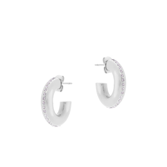 Silver Letter C Earrings with CZ Stones by Tipperary Tipperary's Letter C Earrings, crafted from silver and adorned with Cubic Zirconia stones, add a sophisticated touch to any look. An ideal accessory for formal or everyday wear, these earrings provide a versatile and timeless style.