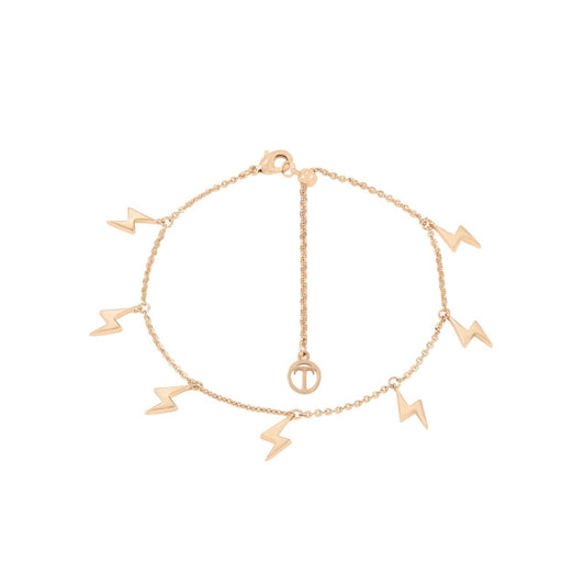 Embrace timeless elegance with this striking seven bolt bracelet from Tipperary. Crafted in gleaming gold, this piece captures the raw power of lightning in a refined, wearable form.