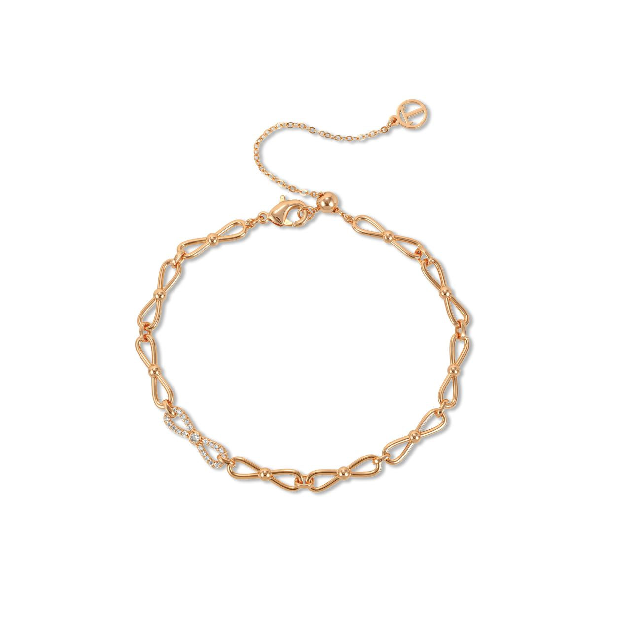 Elegant mini bow bracelet crafted in gold-tone finish, adorned with sparkling cubic zirconia stones. This delicate piece from Tipperary combines timeless design with contemporary sparkle, perfect for everyday wear or special occasions.