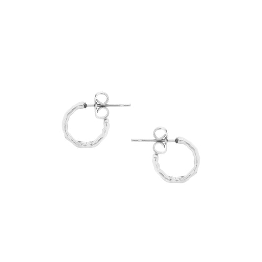 Silver Mini Hoop Earrings by Tipperary  Add a subtle touch of style to any outfit with these timeless Tipperary Mini Hoop Earrings. The mini hoops add a touch of sophistication and beauty to your look. Versatile and easy to wear, these earrings are perfect for every occasion.