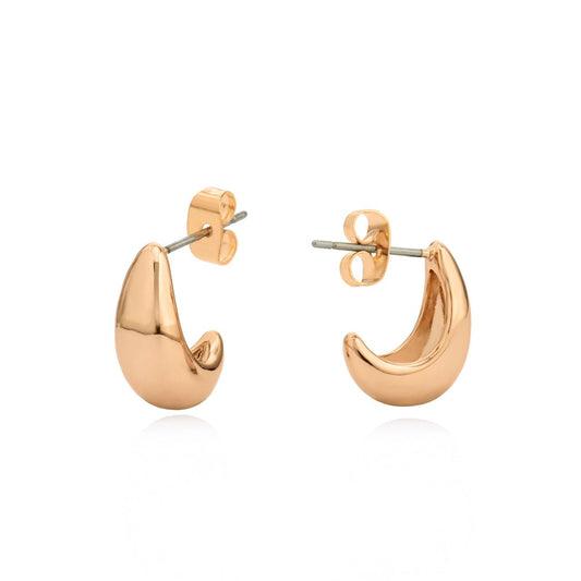 Elevate your elegance with the Tipperary Mini Pebble Hoop Earrings in rose gold. Their subtle, textured pebble design adds a refined touch to any ensemble, merging timeless allure with contemporary style.