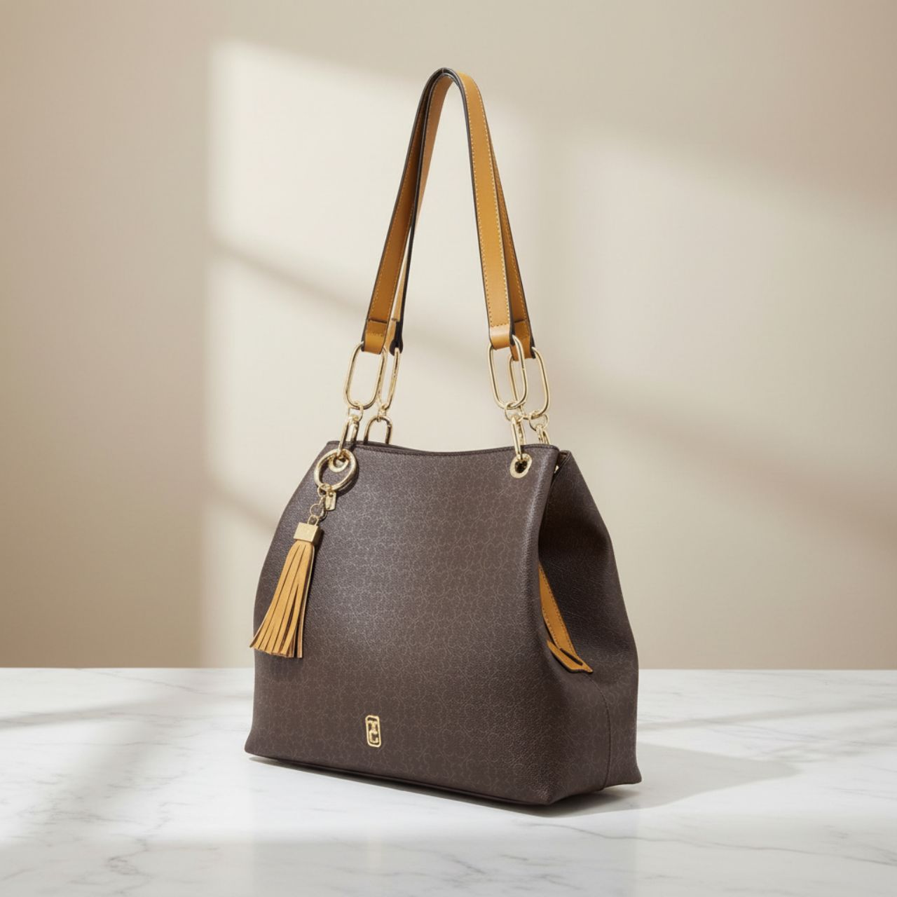 The Tipperary Monogram Tote in Mocha is a sophisticated accessory designed for the discerning user. Crafted with attention to detail, its rich mocha hue complements a variety of styles while the monogram adds a personalized touch. Ideal for everyday use, this tote combines practicality with elegance, offering ample space and durability for your essentials throughout the summer season.