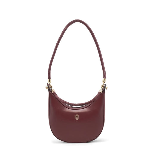 The Tipperary Moon Handbag in Burgundy offers a refined blend of style and practicality for summer 2025. Crafted with attention to detail, its sleek silhouette and warm Burgundy hue complement a variety of outfits, making it an essential accessory for the season.