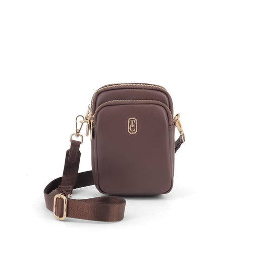 The Naples Mini Cross Body Bag in rich chocolate is the perfect everyday companion. This compact cross body style offers hands-free convenience while maintaining a sophisticated silhouette.