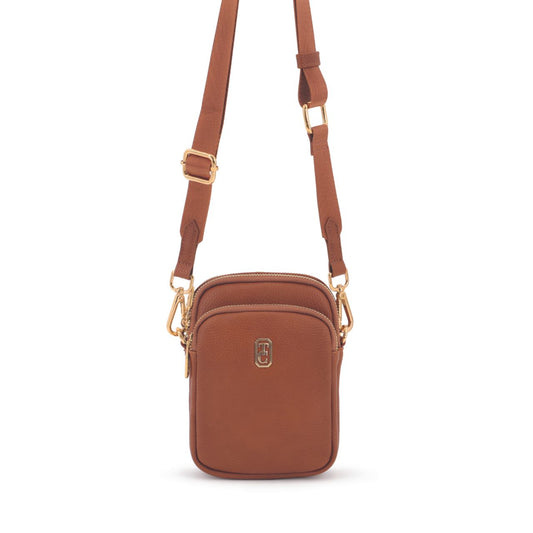 Introducing the Naples Mini Cross Body Bag by Tipperary - the perfect addition to your daily accessories. Crafted in tan, this bag offers both style and functionality. With its compact size, it's ideal for on-the-go essentials. Upgrade your look with this new 2024 release.