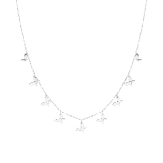 Crafted in silver, this delicately detailed piece captures the grace of nine butterflies in flight, symbolizing transformation and beauty. Its refined design complements both everyday wear and special occasions, adding a subtle yet sophisticated accent to any outfit.