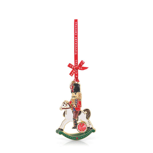 Elevate your holiday décor with the Tipperary Nutcracker on Horse Gem Christmas Decoration. This exquisite ornament blends traditional charm with refined craftsmanship, featuring a detailed nutcracker figure poised on a majestic horse.