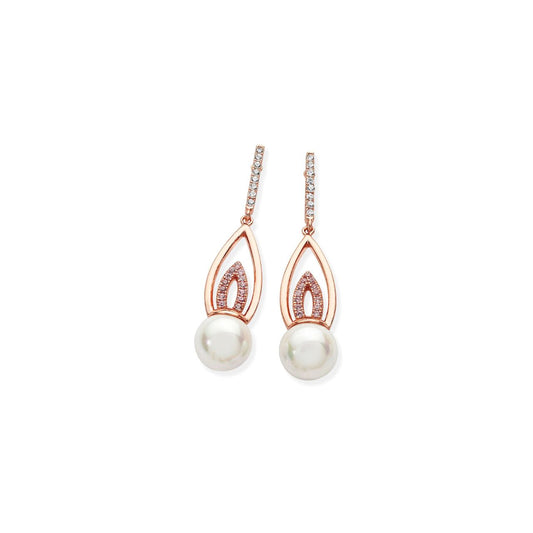 These exceptional drop earrings have an almost art deco feel to them. Fashioned in rose gold they consist of a crystal lined linear bale, a flame shaped polished rose gold piece suspends from this with another flame shape lined in pink crystals, suspending from this unusual piece is an 8mm white shell pearl.