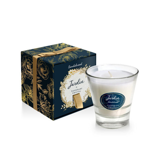 Sandalwood - Jardin Collection Candle by Tipperary  This is a luxuriously rich and decadent scent that has blends of amber and musky sandalwood intertwined with smoked oak and exotic spices. A wonderful aroma that will create an opulent ambiance.