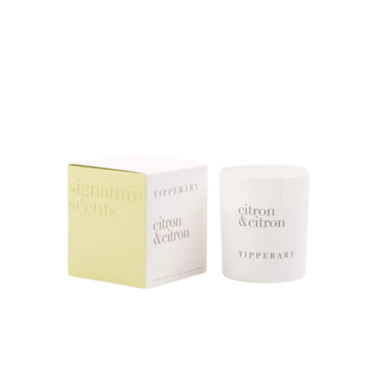 Tipperary's Signature Scented Candle - Citron &amp; Citron is expertly crafted using a blend of natural wax and a braided cotton wick. Each candle is carefully hand-poured and hand-finished, resulting in a clean and toxin-free burn that makes it an ideal choice for your home.