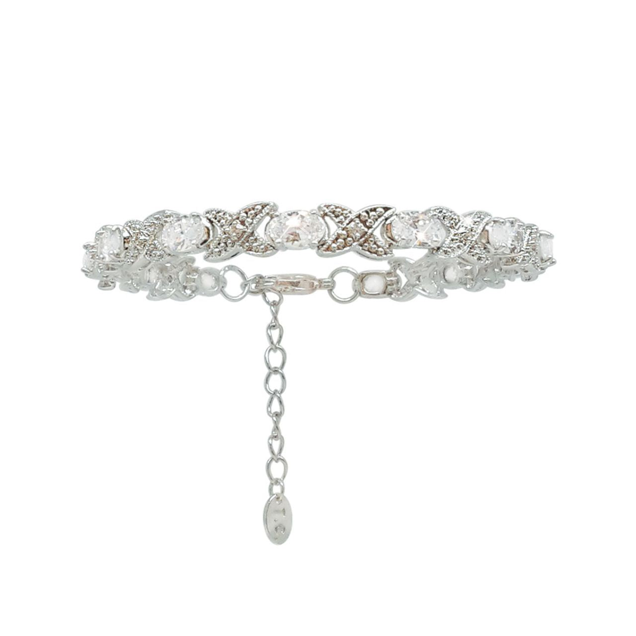 Silver Bracelet X&O by Tipperary  Making an impressive statement of love, this sassy necklace is fashioned in timeless silver. The design features a scintillating row of hugs and kisses in a stylised "XO" fashion. A series of clear, oval crystals replaces each "O," while beautiful crystal pavé accents and a beaded detail decorate the whimsical "X" shapes in between.