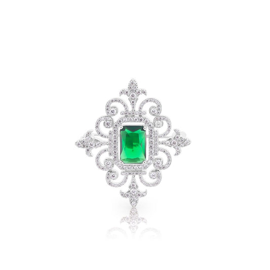 Silver Emerald Brooch by Tipperary. This Silver Emerald Brooch by Tipperary is a timeless piece of jewellery that exudes elegance and sophistication. A stunning emerald gemstone, it adds a touch of luxury to any outfit. Its classic design and intricate details make it a must-have accessory for those with refined taste. Elevate your style with this exquisite brooch from Tipperary.